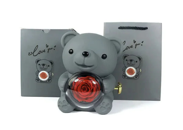 Gift box with rotating bear and box of roses 
