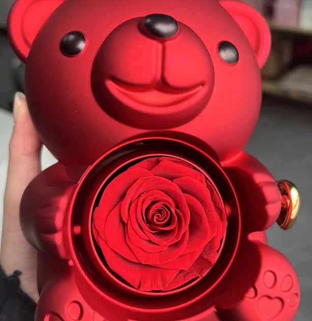 Gift box with rotating bear and box of roses 