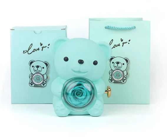 Gift box with rotating bear and box of roses 