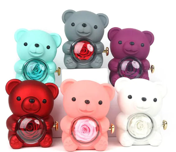 Gift box with rotating bear and box of roses 