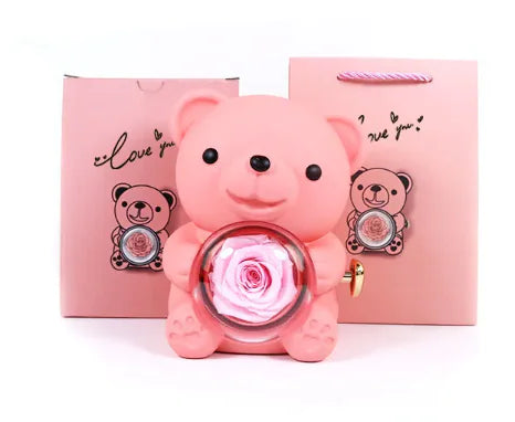 Gift box with rotating bear and box of roses 