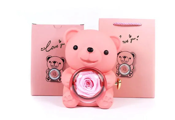 Gift box with rotating bear and box of roses 