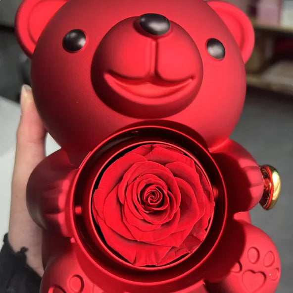 Gift box with rotating bear and box of roses 